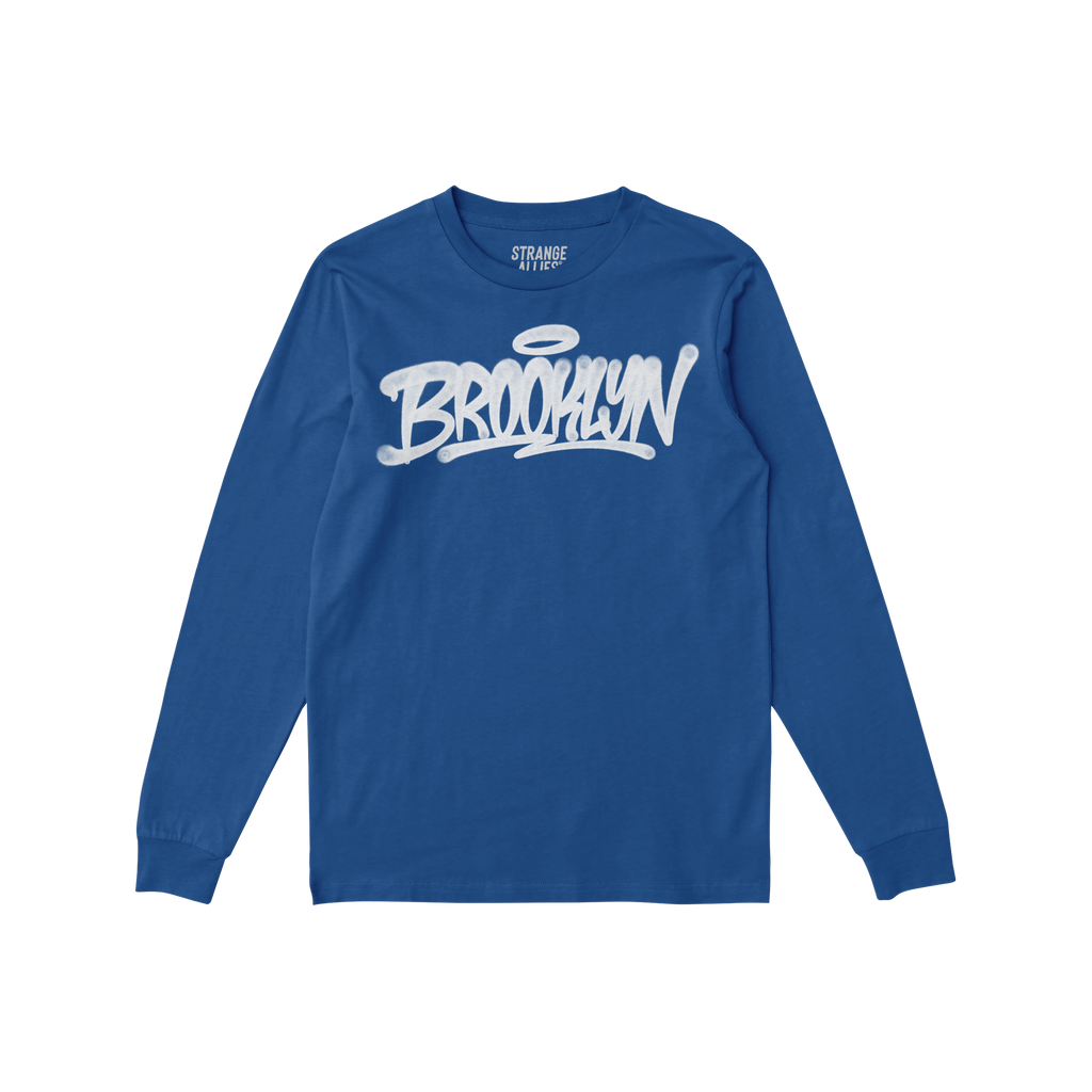 Blue Brooklyn Handstyle T-shirt featuring a graffiti-style BROOKLYN logo with a halo, laid flat. Ideal for showcasing borough