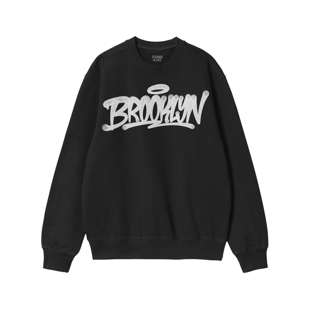 Brooklyn Handstyle Hoodie & Sweatshirt features a black crewneck with Brooklyn in white graffiti script and a halo, embodying