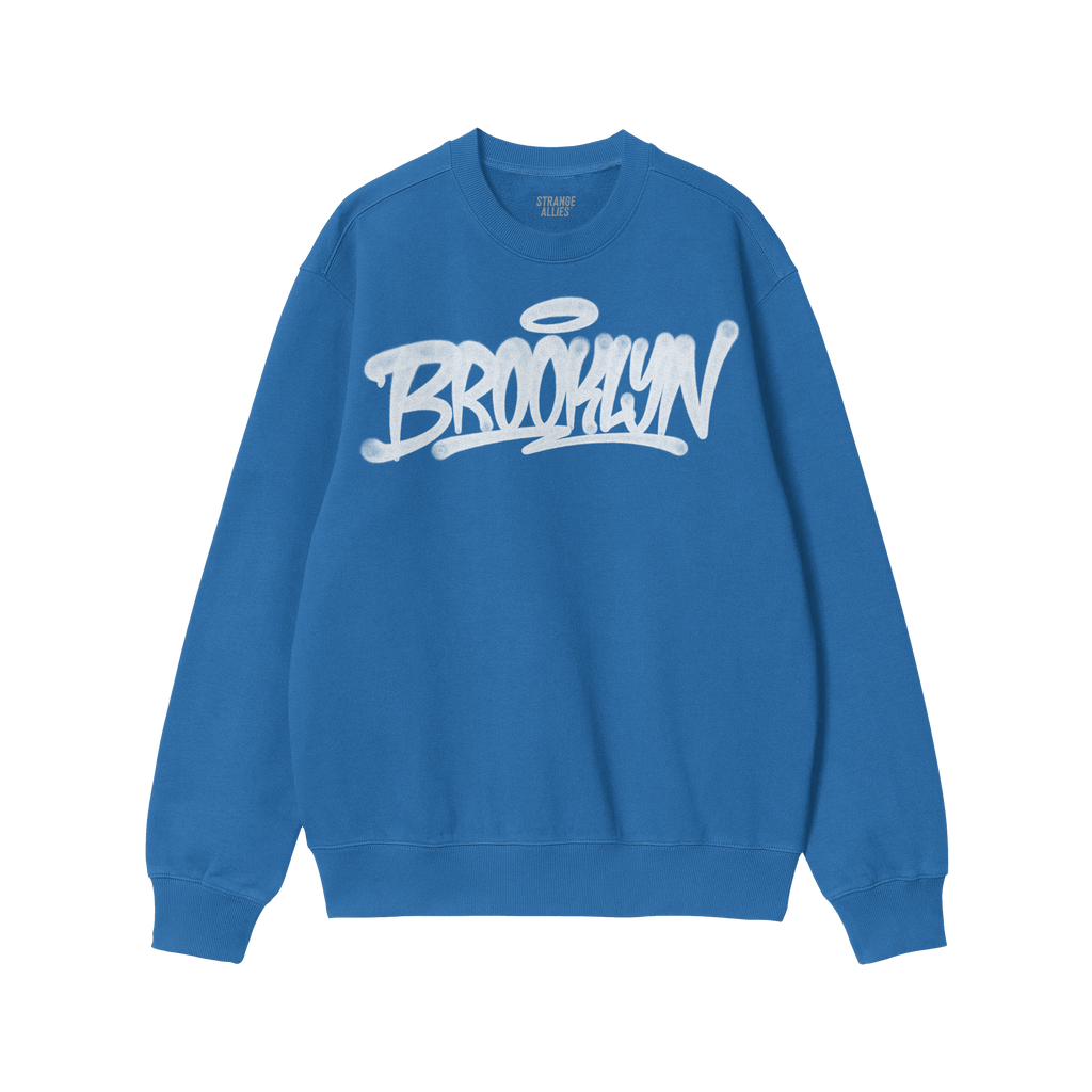 Brooklyn Handstyle Hoodie & Sweatshirt in royal blue, featuring a white spray-paint BROOKLYN graphic across the chest. Ribbed