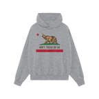 California Gadsden Flag Shirt: A light-gray pullover hoodie featuring a grizzly bear, red star, and “DON’T TREAD ON US”