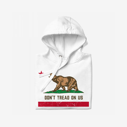 California Gadsden Flag Hoodie, featuring a brown bear on grass with DON'T TREAD ON US slogan below, embodies anti-authoritarian spirit and radical resistance with a partially visible red star above.