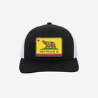 California Gadsden Flag Trucker Hat with a yellow patch featuring a bear, red star, and DON'T TREAD ON US text. Represents unity and defiance with an adjustable mesh back.