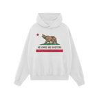 White hoodie featuring the California No Kings Flag Shirt design: a roaring bear on grass, red star above, slogan “NO KINGS