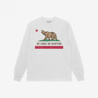 California No Kings Flag Shirt with a distressed California flag design features a roaring bear, red star, and slogan NO KINGS NO MASTERS, symbolizing rebellion and autonomy. Vintage-washed, long-sleeve style.
