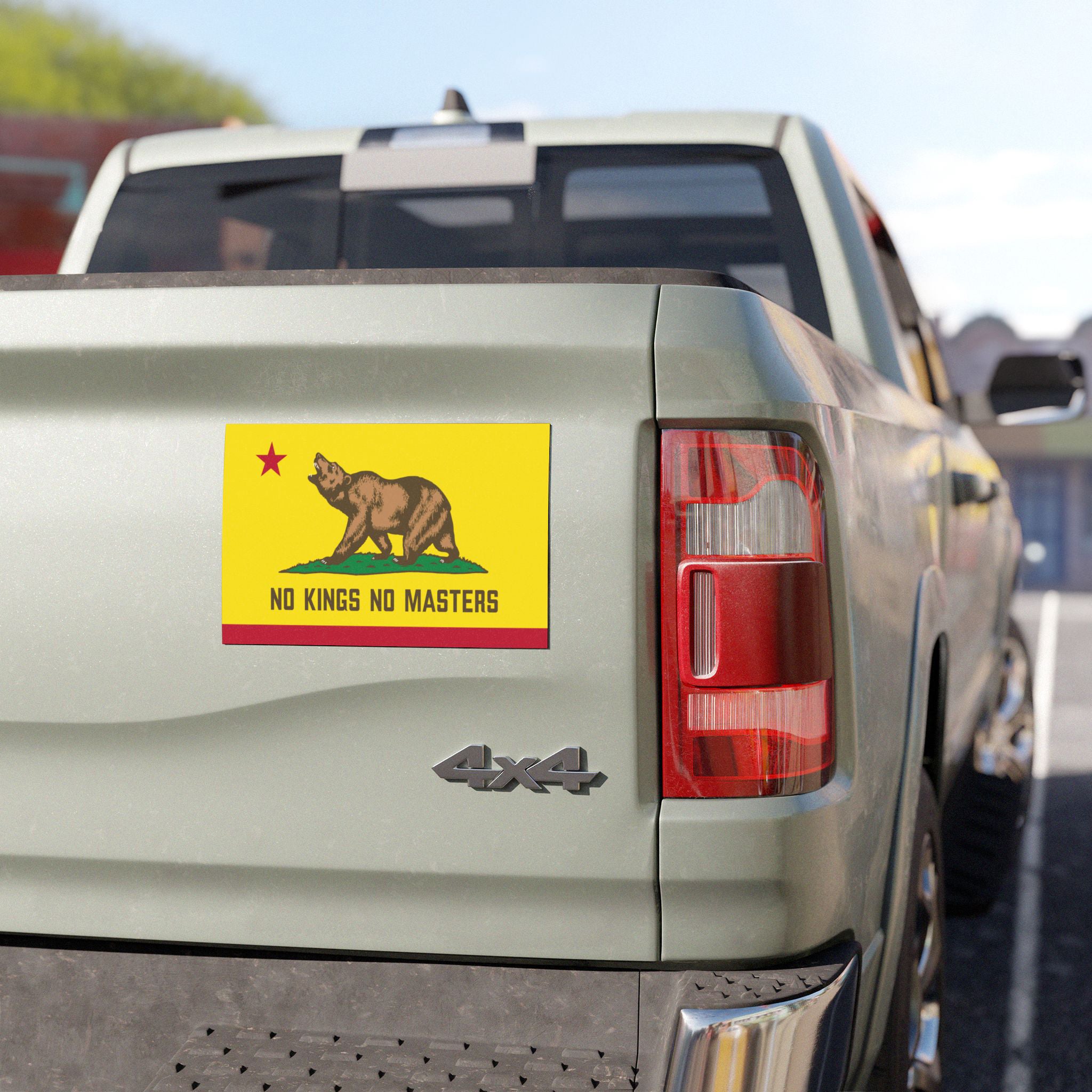 California Flag No Kings Sticker & Magnet on a light-green 4x4 truck's tailgate, showcasing a bear design with NO KINGS NO MASTERS, symbolizing resistance and California pride.
