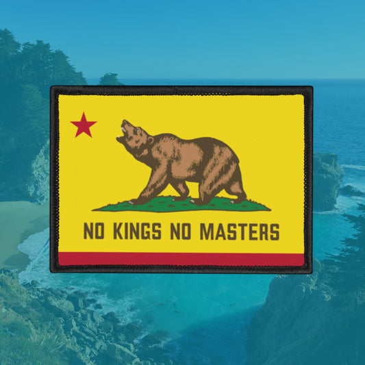 California Flag No Kings Patch: Rectangular patch featuring a brown bear, red star, and the slogan NO KINGS NO MASTERS on a yellow background, bordered by black stitching and a red stripe.