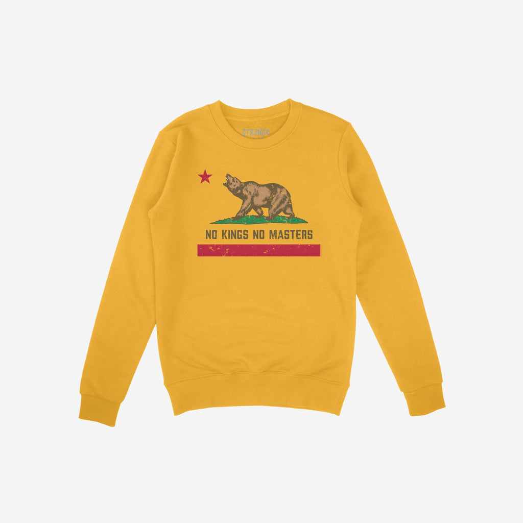 Mustard-yellow crewneck sweatshirt featuring the California No Kings Flag Shirt design; showcases a stylized bear, red star, and stripe with NO KINGS NO MASTERS text, embodying rebellion and autonomy.