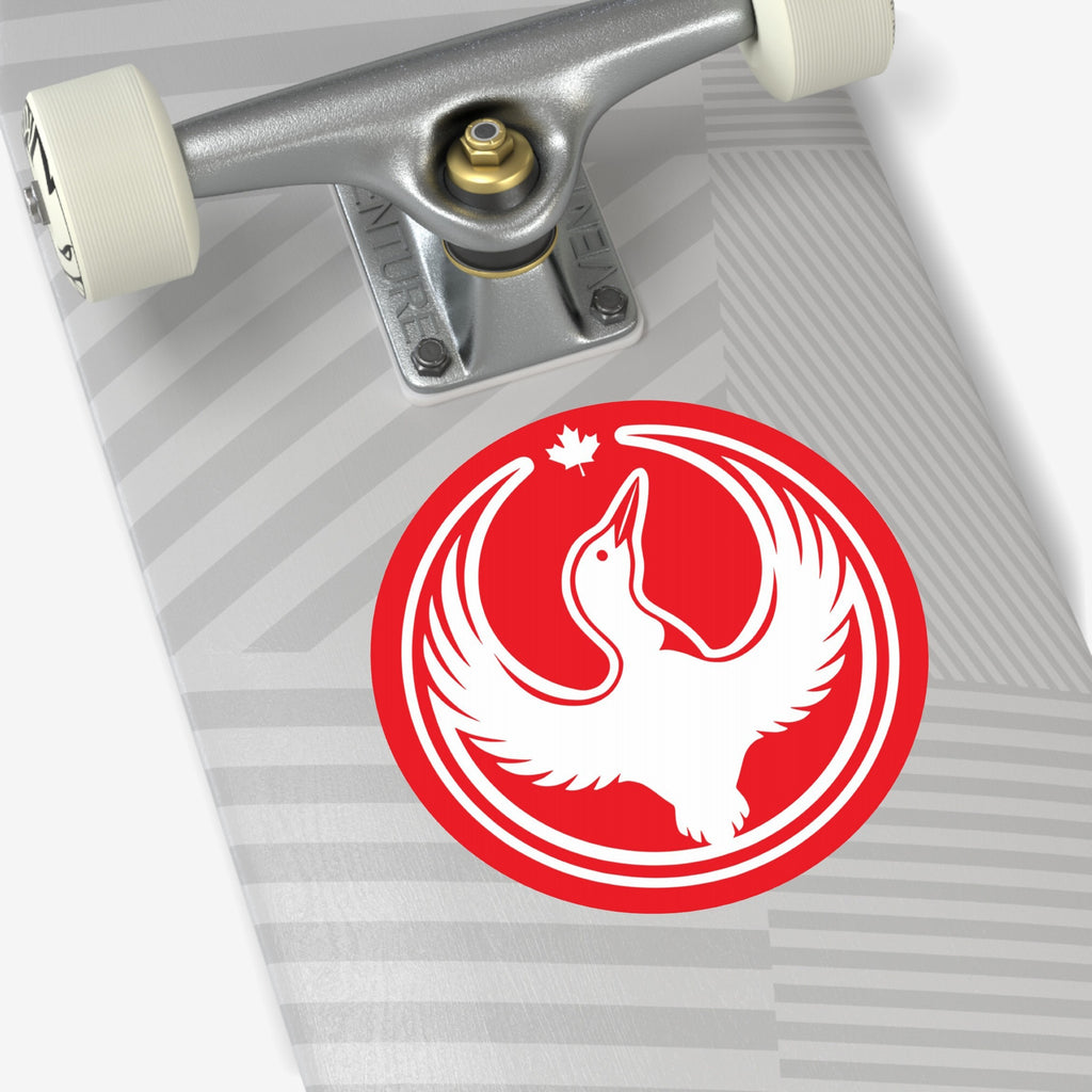 Close-up of a skateboard featuring the Canada Rebel Alliance Sticker, showing a stylized white bird in flight within a bold red circle with a maple leaf above, symbolizing activism and solidarity.