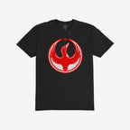 Canada Rebel Alliance T-shirt features a distressed red and white emblem of a stylized bird with outstretched wings, topped with a red maple leaf, embodying anti-fascist and equality ideals.
