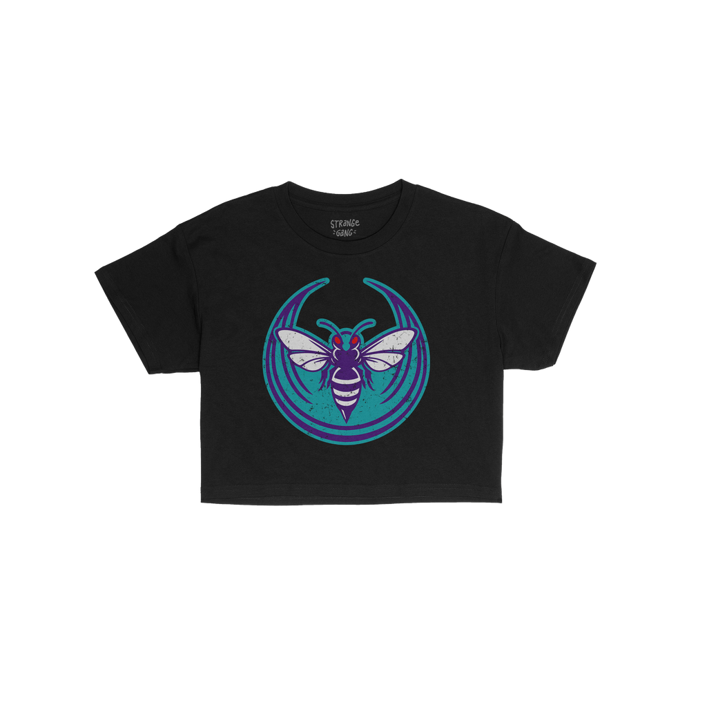 Charlotte Rebel Alliance Women's Baby Tee features a distressed teal and purple hornet graphic with white wings and red eyes,