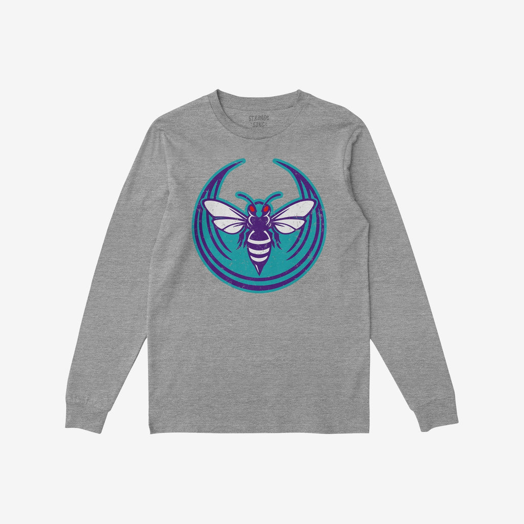 Heather-gray Charlotte Rebel Alliance T-shirt with a bold, stylized hornet graphic in teal, purple, white, and red on the chest, embodying anti-fascist and pro-equality values.