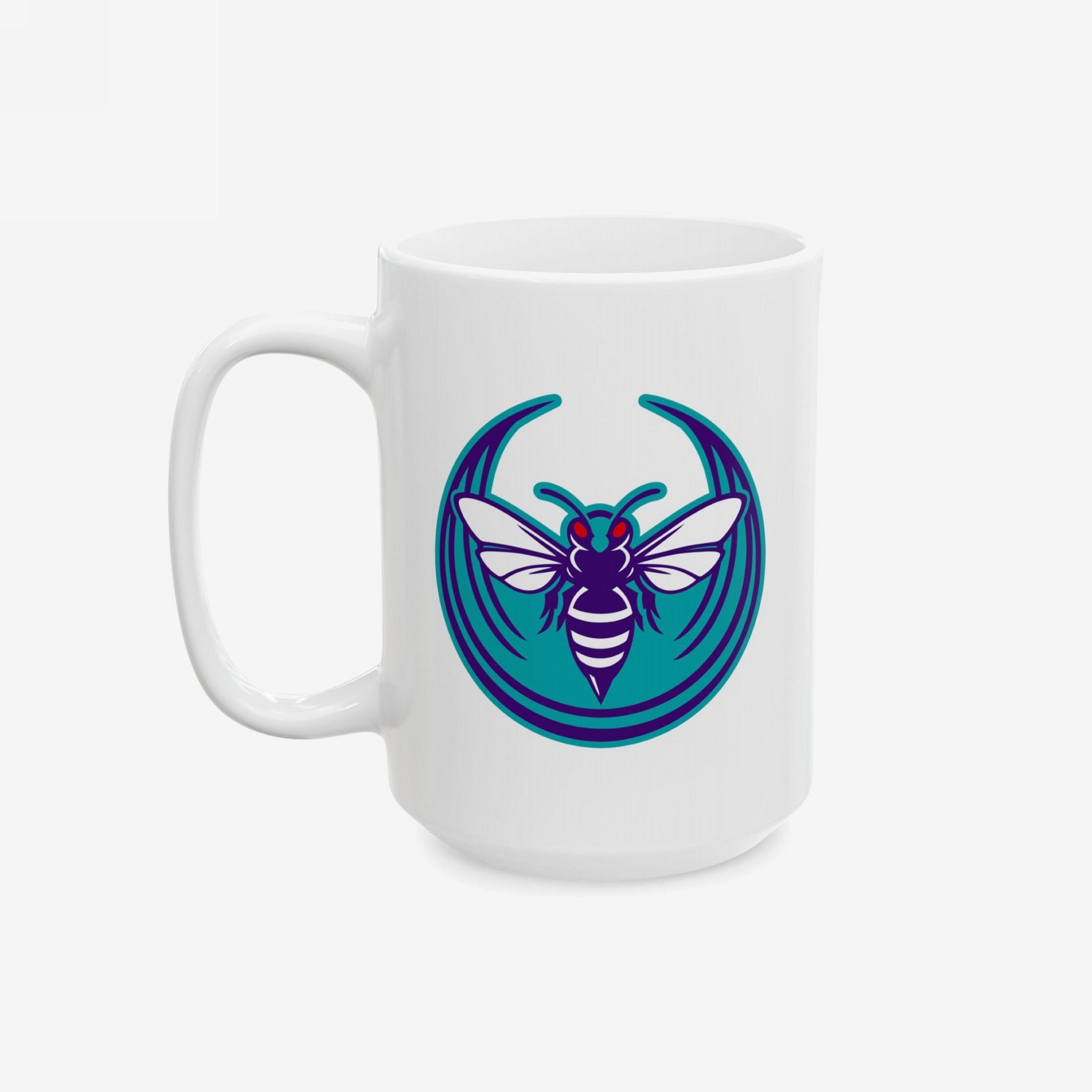 Charlotte Rebel Alliance Mug featuring a bold hornet emblem with red eyes and striped abdomen, set against a teal background. Available in two sizes, it’s dishwasher and microwave safe, perfect for morning activism.