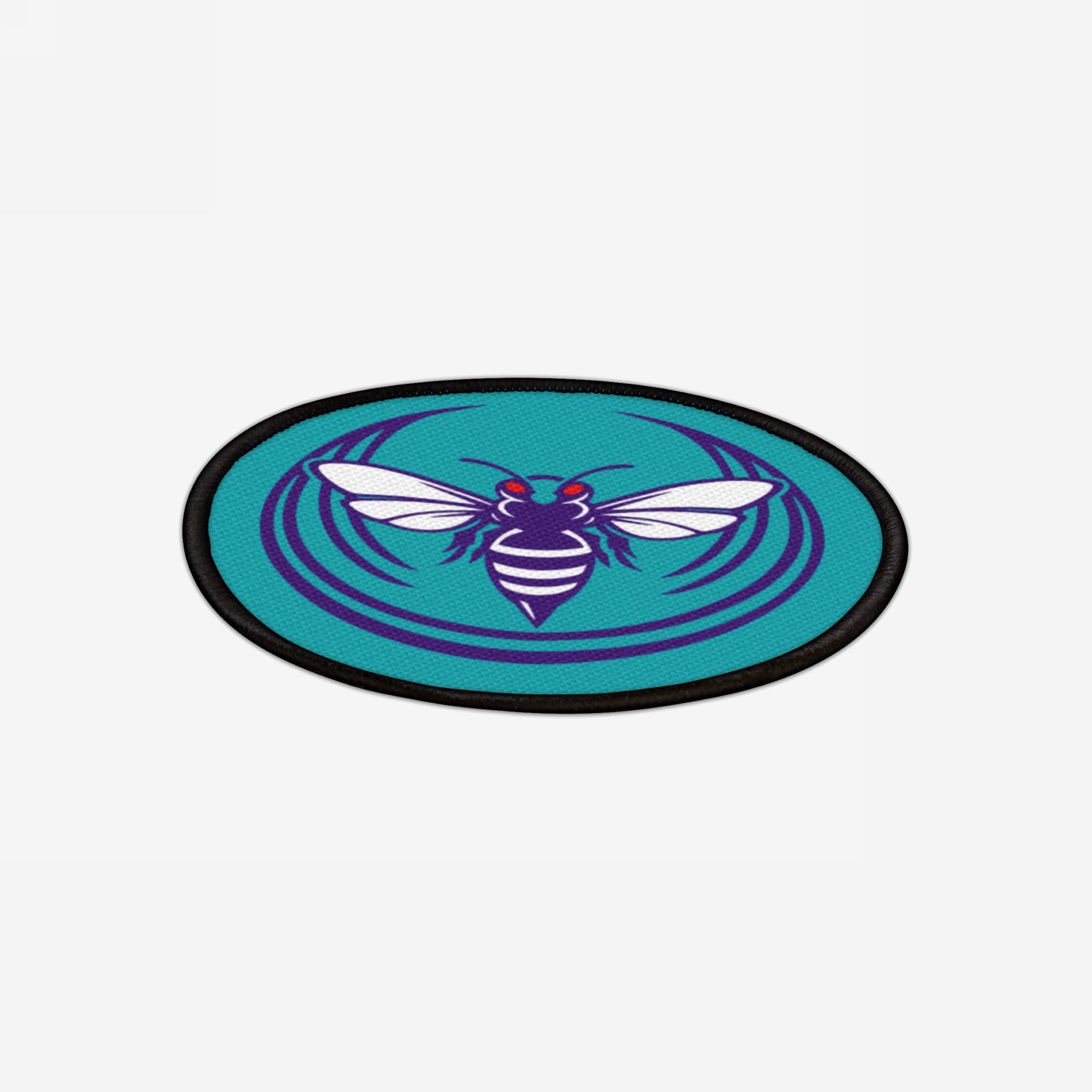 Charlotte Rebel Alliance Patch featuring a stylized hornet with red eyes, symbolizing resistance and activism. Perfect for jackets and bags, embodying anti-fascist and immigrant rights support.