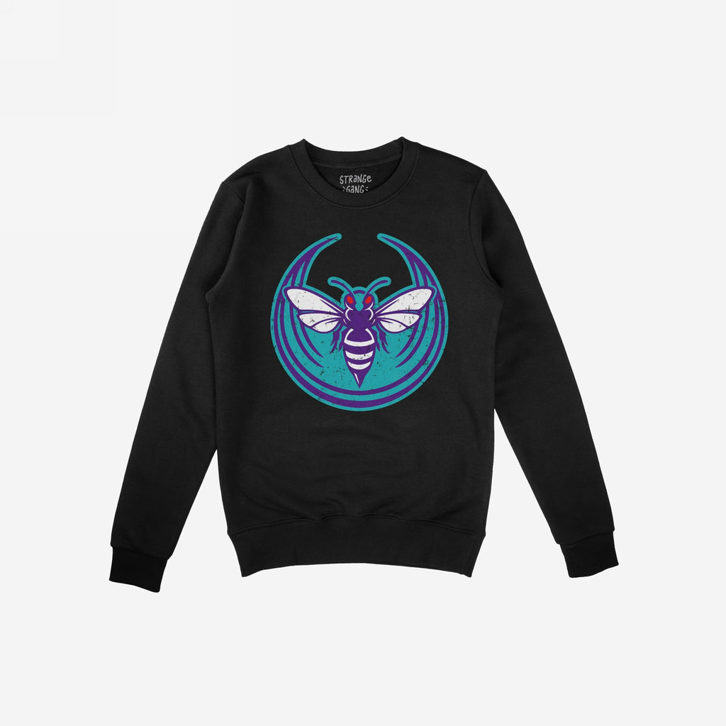 Charlotte Rebel Alliance Sweatshirt featuring a bold hornet graphic in purple, teal, and white with red eyes, symbolizing anti-fascist and protest-ready spirit, on a black crew-neck design.