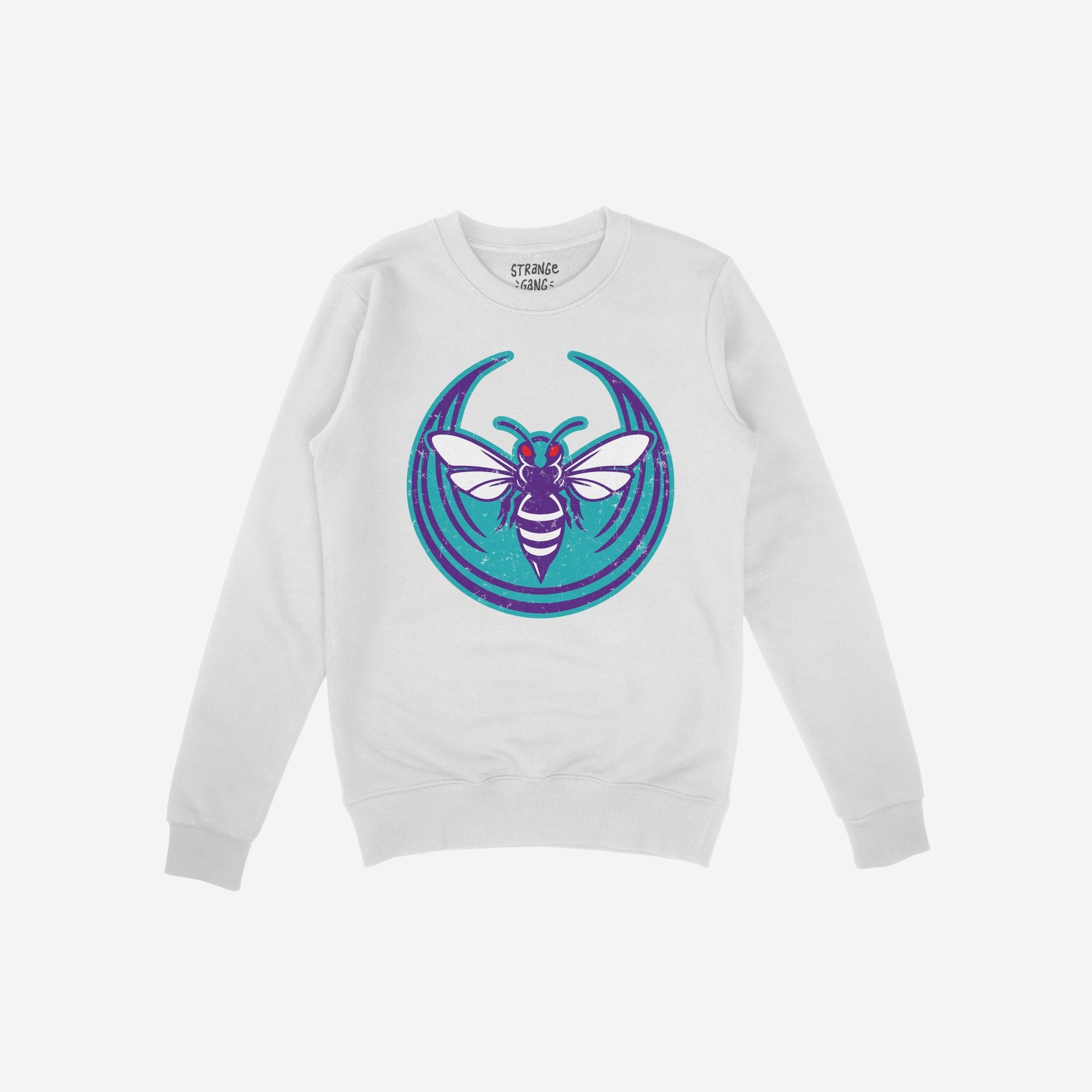 White crewneck sweatshirt featuring the Charlotte Rebel Alliance design, with a bold purple and white hornet graphic, red eyes, and teal background. A statement piece for anti-fascist and protest-ready individuals.