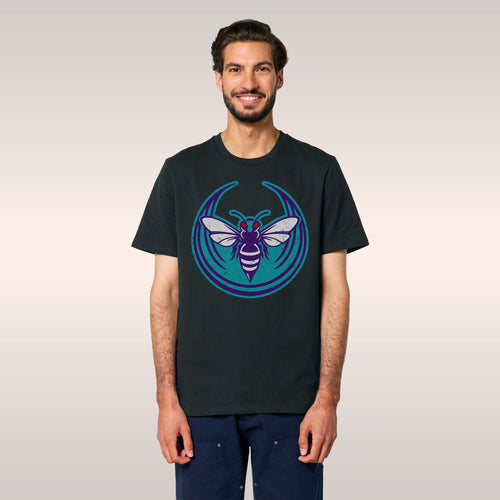 Young person on a rooftop wearing the Charlotte Rebel Alliance T-shirt, featuring a bold teal and purple hornet graphic, embo