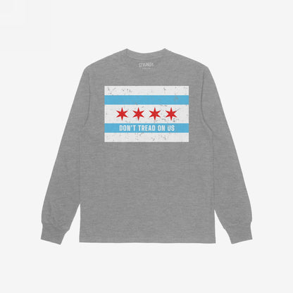 Heather-gray Chicago Gadsden Flag Shirt with a distressed flag graphic and “DON’T TREAD ON US” slogan, embodying resistance and community spirit, laid flat showcasing back design.