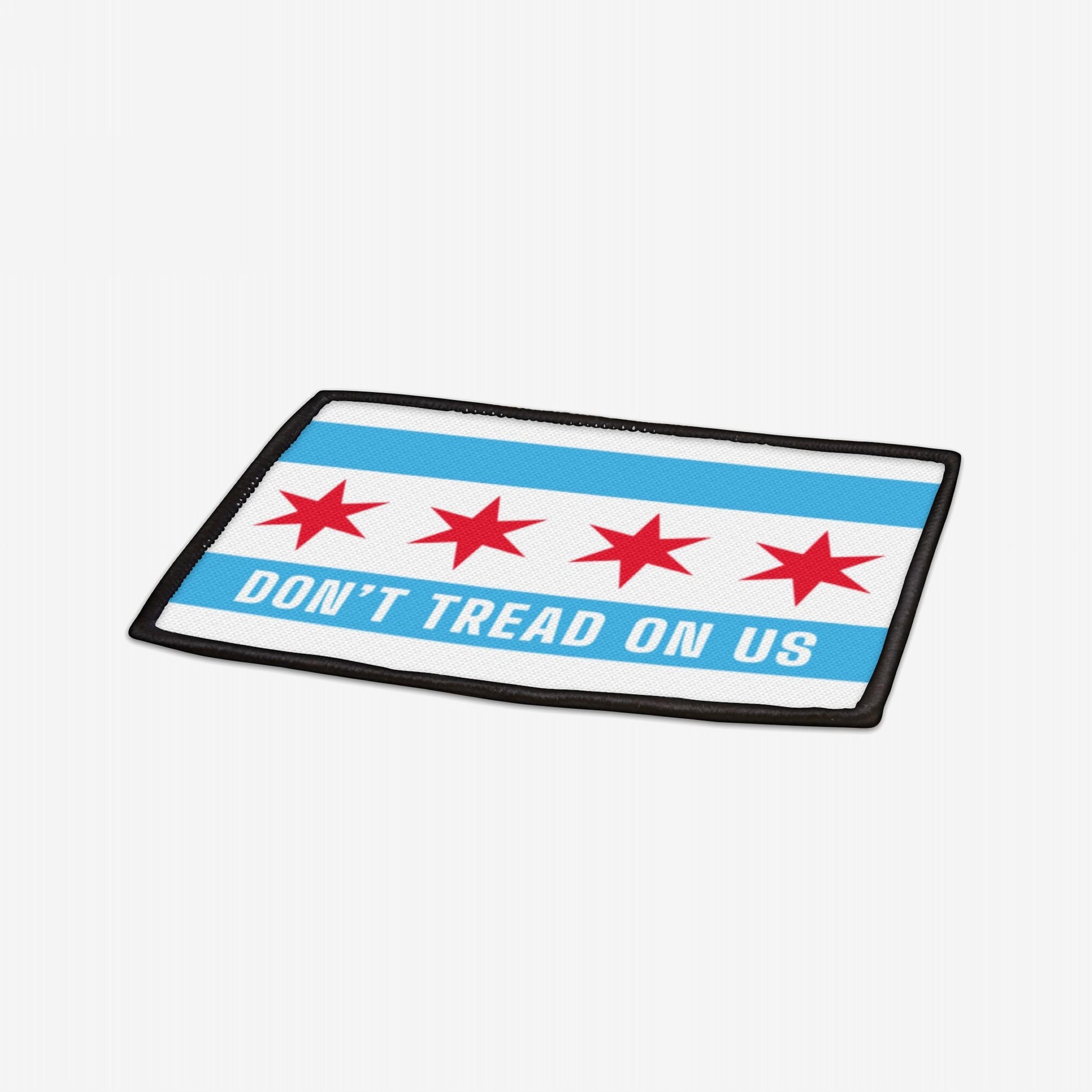 Chicago Gadsden Flag Patch featuring four red stars and light-blue stripes with DON'T TREAD ON US slogan, embodying resistance and civic justice. Rectangular, 3.5 x 2.5, with black border and iron-on backing.