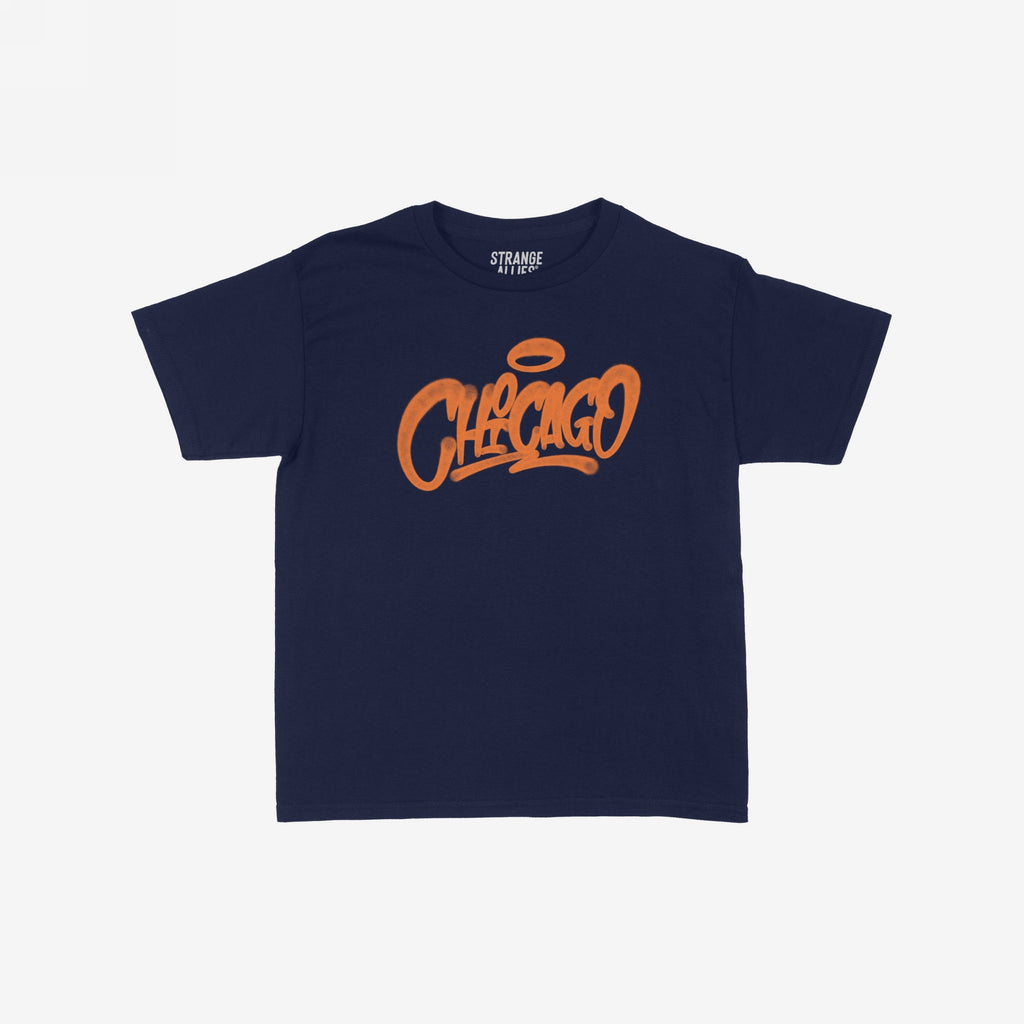Chicago Handstyle Women's Baby Tee features a navy-blue design with orange graffiti-style Chicago and a halo motif, capturing a retro Y2K vibe with edgy, city-inspired flair.