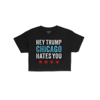 Chicago Hates Trump Women's Baby Tee features bold letters HEY TRUMP, CHICAGO HATES YOU with four red stars, capturing a prot