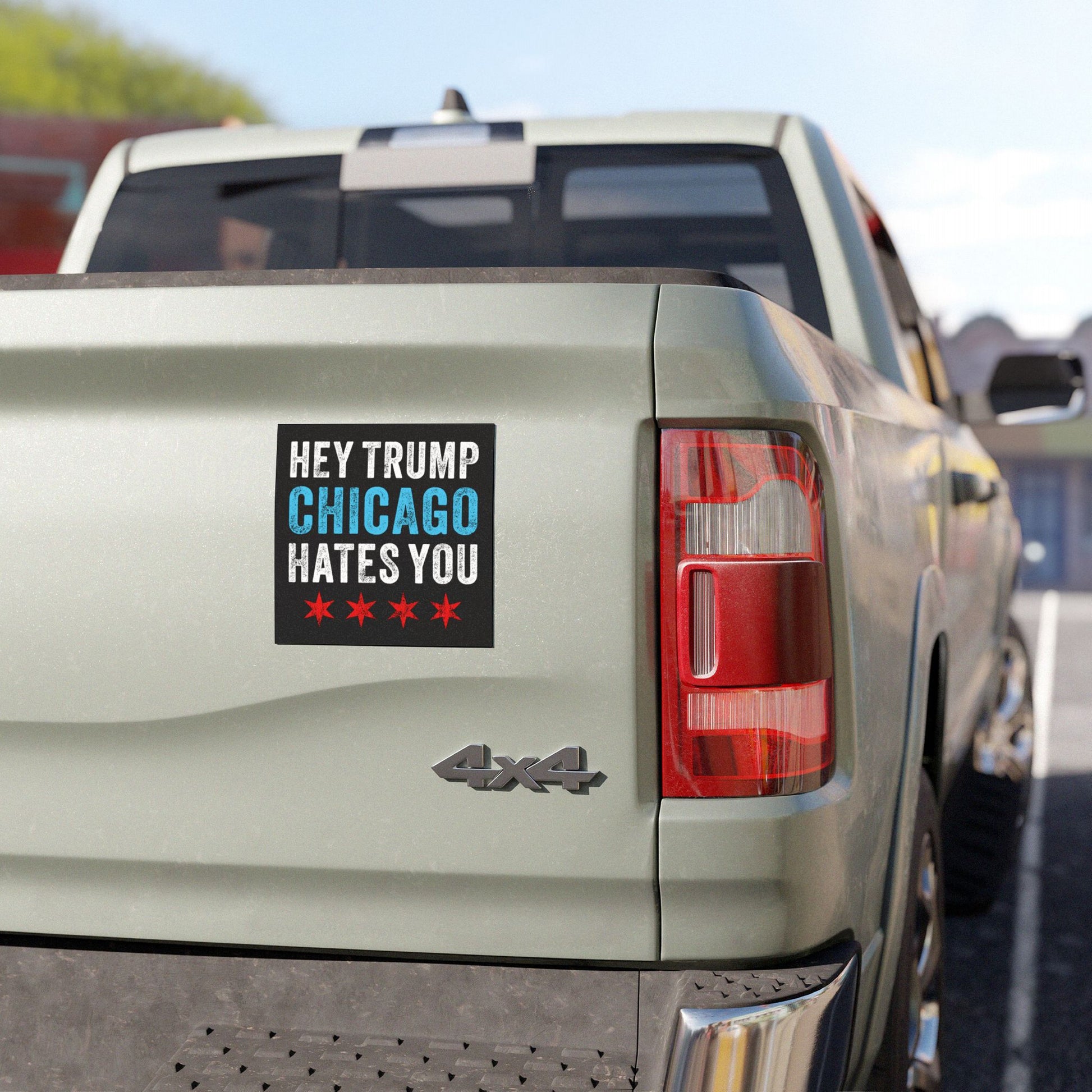 The image displays a Chicago Hates Trump Sticker & Magnet on a 4x4 pickup truck tailgate, featuring bold text and four red stars, symbolizing defiant Midwest activism against MAGA politics.