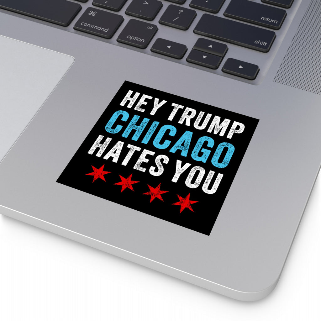 Chicago Hates Trump Sticker & Magnet on a laptop palm-rest features bold text and stars, presenting a statement against MAGA politics and ICE brutality, encapsulating Chicago's activist spirit.