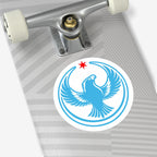 Chicago Rebel Alliance Sticker on skateboard deck, featuring a peregrine falcon rising under a red star, symbolizing anti-fascist protest art. Silver truck and white wheels attached to deck with light-gray stripes.