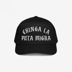 The Chinga La Migra Hat features bold, white Old English embroidery stating “CHINGA LA PUTA MIGRA,” symbolizing a strong stance against immigration authorities and supporting immigrant rights.