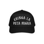 The Chinga La Migra Hat features bold, white Old English embroidery stating “CHINGA LA PUTA MIGRA,” symbolizing a strong 