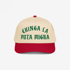 Chinga La Migra Hat features a tan crown and red bill with bold green embroidered text. Ideal for anti-fascist protests, it embodies defiance against CBP/ICE, aligning with equality and immigrant rights.