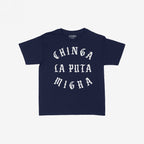 Chinga La Migra Women's Baby Tee in navy blue, featuring bold white Old English–style arc lettering with a rebellious message, embodying the spirit of activism and standing against immigration authorities.