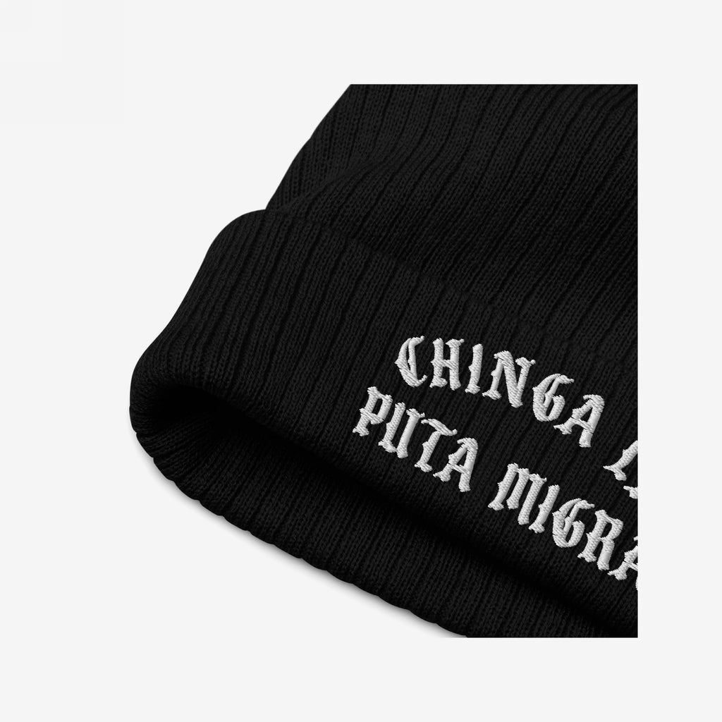 Black rib-knit Chinga La Migra Hat with white Old English embroidery, featuring an anti-fascist protest message. Suitable for activists passionate about immigrant rights and opposing CBP/ICE policies.