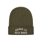 Olive-green rib-knit beanie titled Chinga La Migra Hat, features bold white Old English embroidery stating “CHINGA LA PUTA 