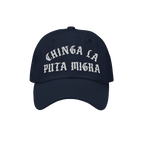 Navy-blue Chinga La Migra Hat with bold Old English-style white embroidery, embodying anti-fascist sentiment. Ideal for prote
