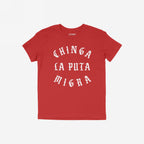 Red Chinga La Migra T-shirt with bold white CHINGA LA PUTA MIGRA slogan in vintage blackletter type, embodying anti-fascist and immigrant rights sentiments. Short-sleeved design for impactful statement wear.