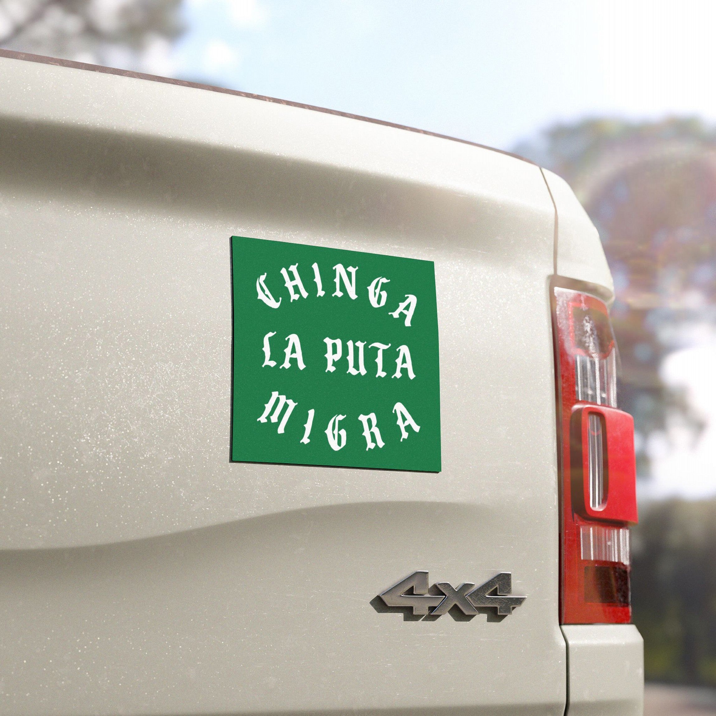 Chinga La Migra Sticker & Magnet on a 4x4 tailgate, featuring bold anti-fascist message for immigrant support, visible alongside taillight and 4x4 badge, highlighting defiance and advocacy.