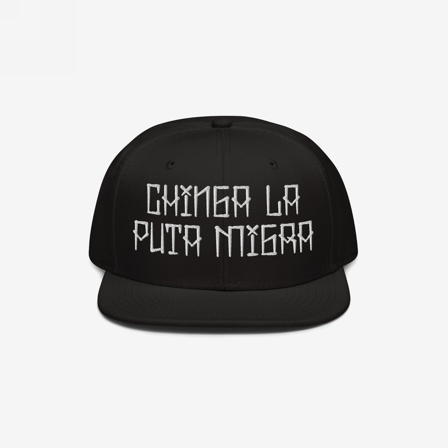 Black flat-brimmed baseball cap with bold white embroidery Chinga La Migra, symbolizing resistance against oppressive immigration systems.