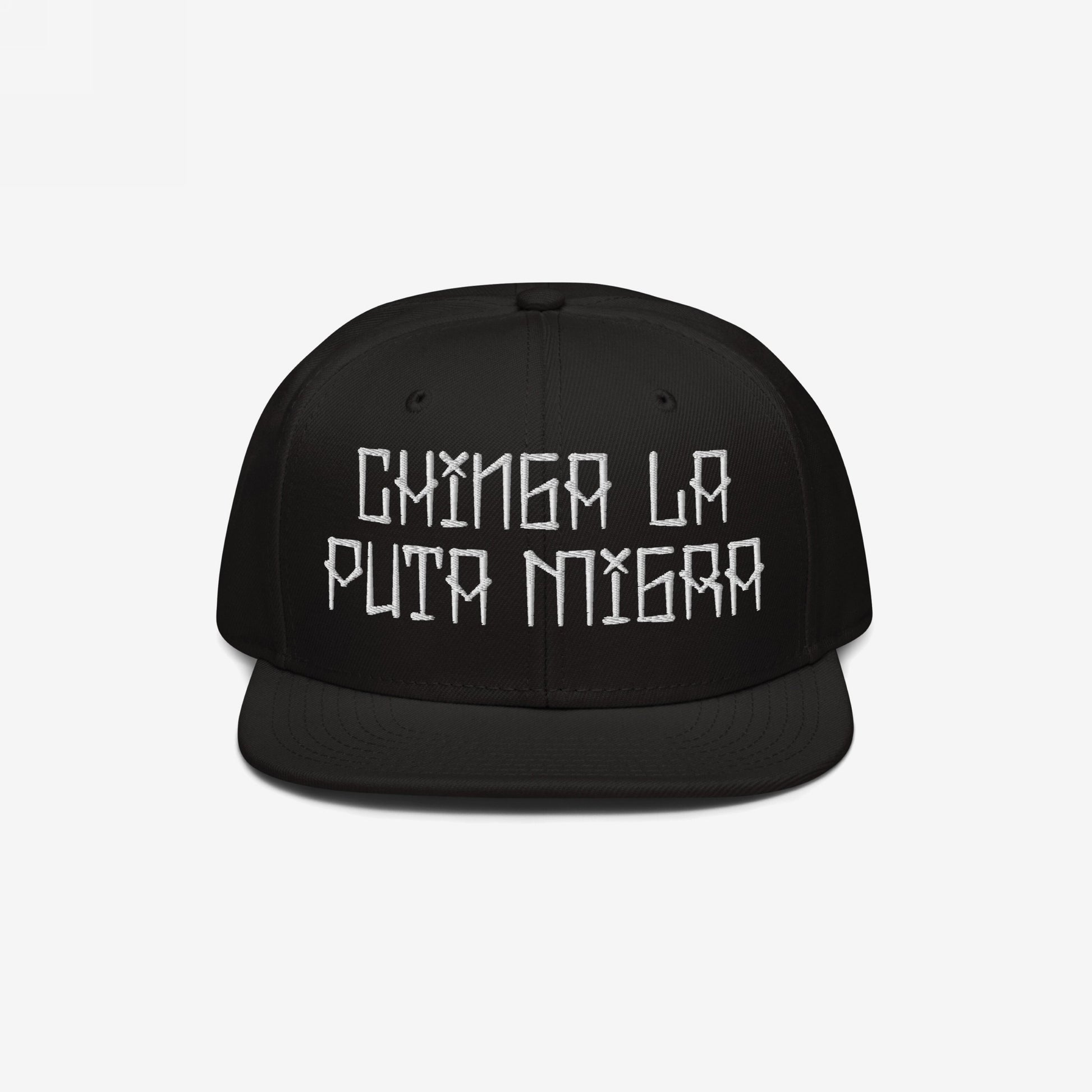 Black flat-brimmed baseball cap with bold white embroidery Chinga La Migra, symbolizing resistance against oppressive immigration systems.