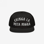 The Chinga La Migra Hat features bold, white Old English embroidery on the front, delivering a powerful anti-fascist message, ideal for immigrant rights defenders and protest attendees.