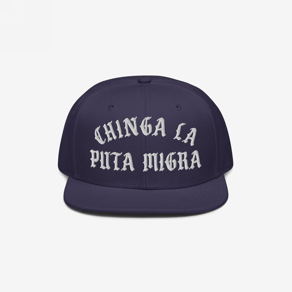 Chinga La Migra Hat: A dark-navy snapback featuring bold white Old English embroidery, symbolizing resistance against ICE, ideal for those advocating immigrant rights and social justice.