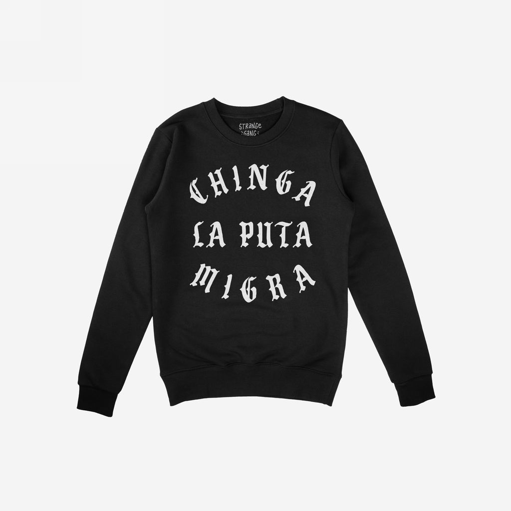 Chinga La Migra Hoodie & Sweatshirt features bold white Old English lettering stating CHINGA LA PUTA MIGRA on a black crew-neck, symbolizing protest and solidarity with immigrant rights and anti-fascist movements.