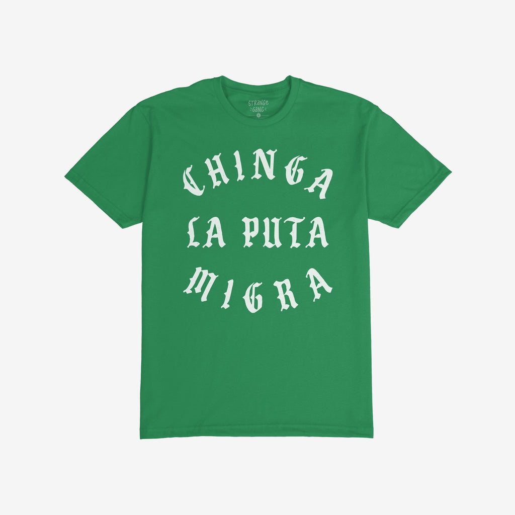 Chinga La Migra T-shirt displaying the phrase “Chinga la puta migra” in white Gothic-style lettering on a solid green background, embodying an anti-fascist, pro-immigrant message.