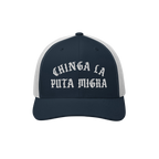 Chinga La Migra Hat: A navy trucker cap with bold Old English embroidery, embodying anti-fascist sentiment. Ideal for those a