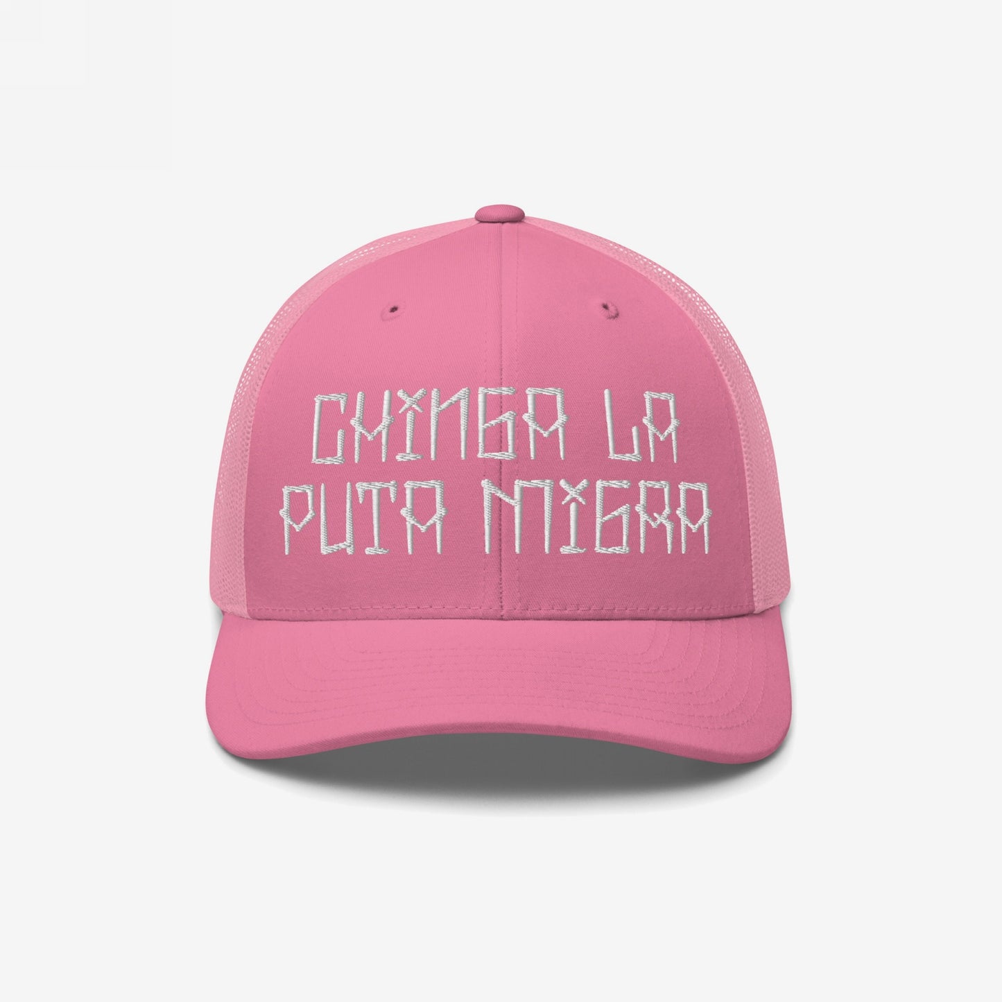 Pink mesh-back trucker cap, featuring white embroidered text CHINGA LA PUTA MIGRA, embodies resistance and defiance against oppressive systems.