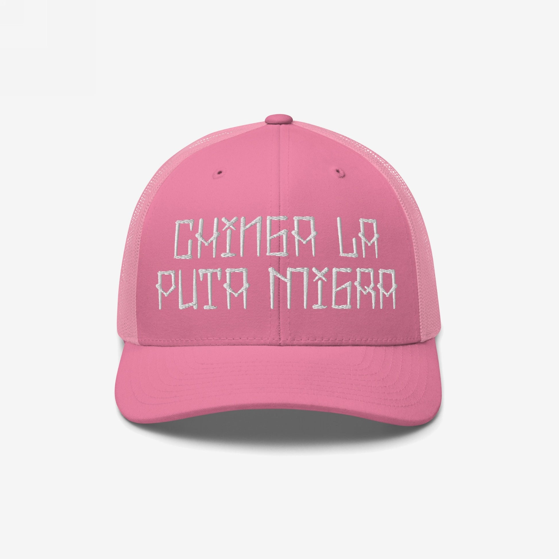 Pink mesh-back trucker cap, featuring white embroidered text CHINGA LA PUTA MIGRA, embodies resistance and defiance against oppressive systems.