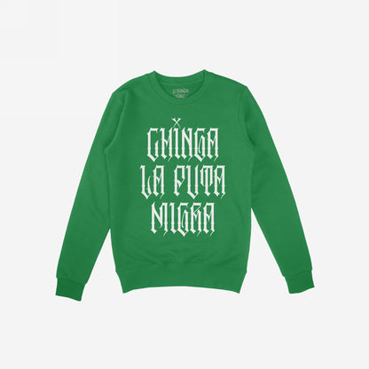 Green crew-neck sweatshirt with bold white Gothic lettering stating “CHINGA LA PUTA MIGRA,” representing the Chinga La Migra Hoodie & Sweatshirt. The design features a strong, unfiltered message calling out oppressive systems.