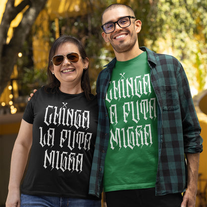 Two adults wear Chinga La Migra T-shirts with bold Gothic lettering, embodying resistance and unapologetic energy. The woman sports aviator sunglasses, the man wears clear frames and a flannel shirt.