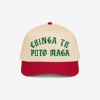 Chinga Tu MAGA Hat: A two-tone baseball cap with a red bill and beige crown, featuring green Old English–style embroidery stating “CHINGA TU PUTO MAGA”, embodying anti-fascist and anti-Trump sentiments.