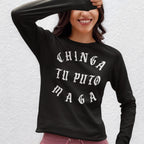 Person wearing Chinga Tu MAGA T-shirt in black with bold, white Old English text, smiling and partially covering eyes, against a plain background, embodying anti-fascist and protest sentiments.