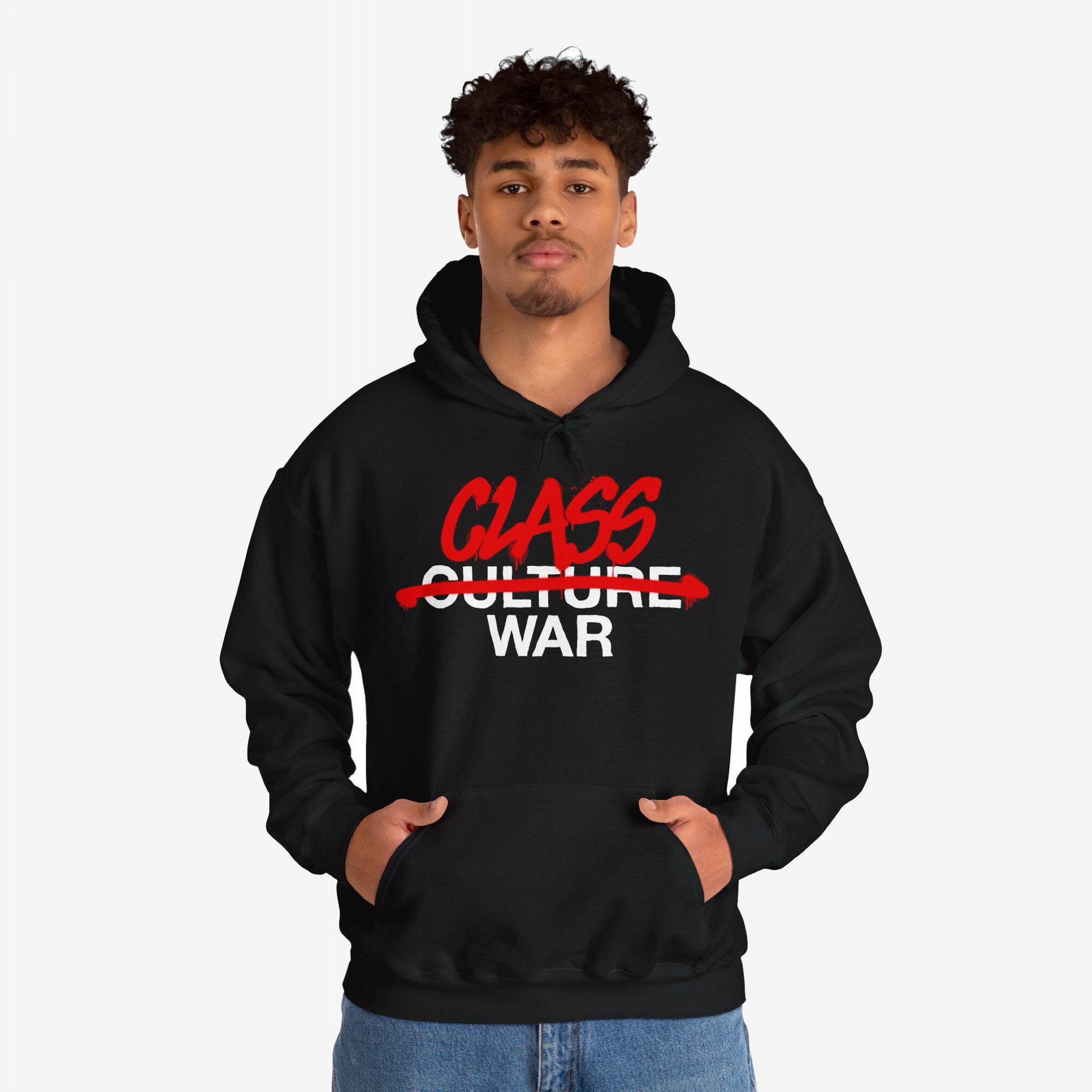 A young man wears the Class War Shirt—a black hoodie featuring CLASS WAR in bold, activist-style graffiti. It's designed for those advocating equality and challenging societal norms.